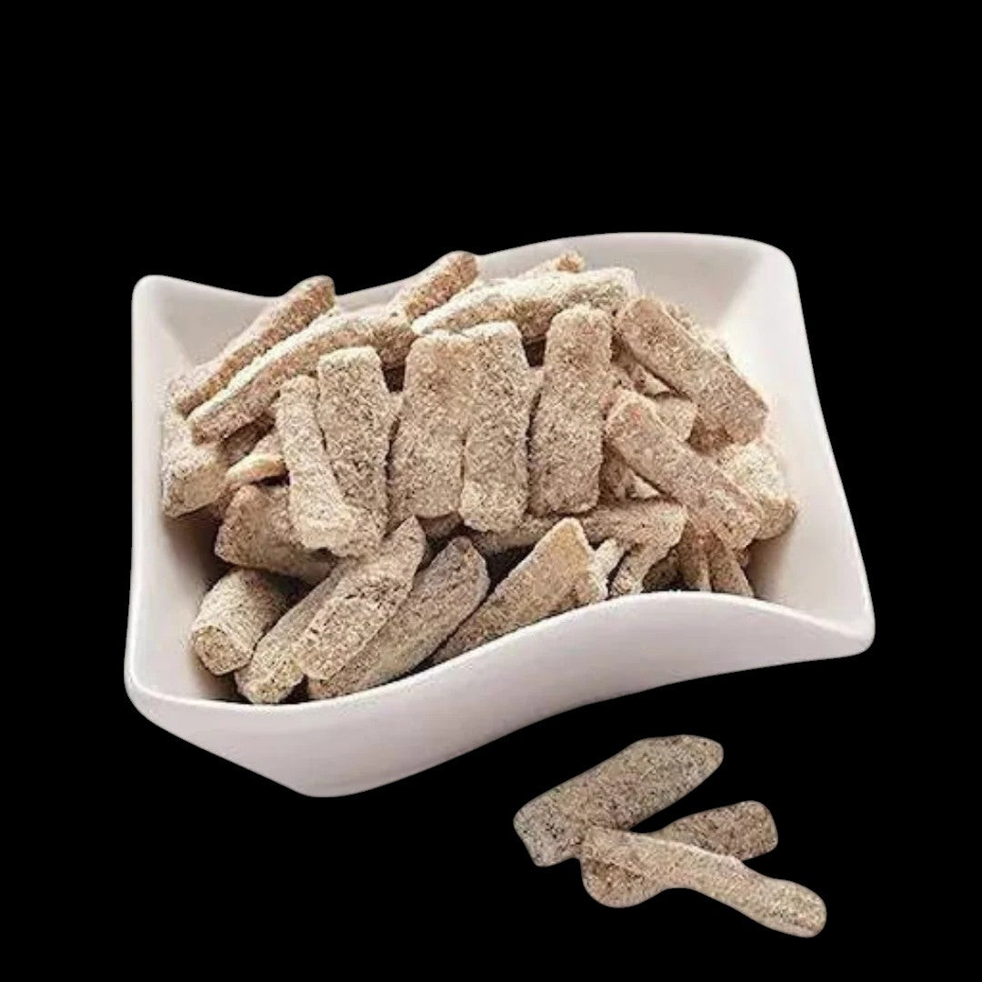 Desipan Aam Papad Slices, traditional Indian fruit leather made from sun-dried mango pulp, chewy strips with a tangy-sweet flavor.