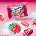 Desipan Alpenliebe Gold Cream Strawberry Flavour Toffee, featuring a strawberry and cream swirl candy.