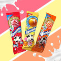 Desipan Alpenliebe lollipops in Strawberry, Caramel, and Orange flavors. Features paper sticks and cartoon cows.