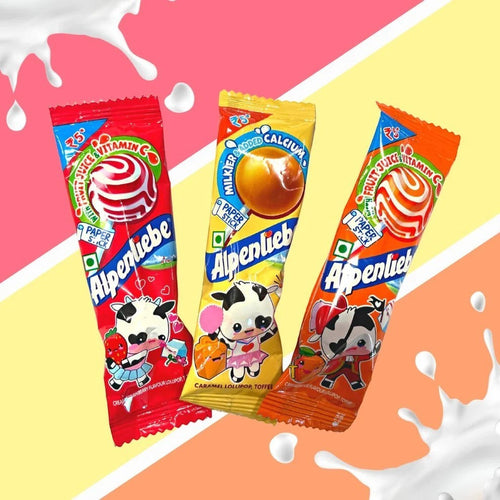 Desipan Alpenliebe lollipops in Strawberry, Caramel, and Orange flavors. Features paper sticks and cartoon cows.