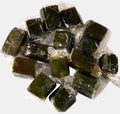 Desipan Assorted Fruit Chewy Candies, individually wrapped in clear cellophane, deep green color.