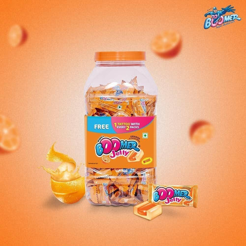 Desipan Boomer Jelly Orange Flavoured candies in a jar, individually wrapped with a free tattoo offer.