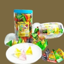 Desipan Campfire Mixed Fruit Jelly Candy Jar, individually wrapped triangle candies in assorted fruit flavors.