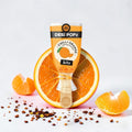 Desipan Desi Popz Chilli Orange Bitz popsicle with real fruit bits and a hint of chili.