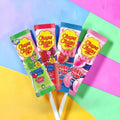 Desipan Chupa Chups bubble gum filled lollipops in sour green apple, cherry, and strawberry flavors.