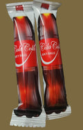 Desipan Coca-Cola Juicy Balls candy, individually wrapped, with classic cola flavor and chewy texture.