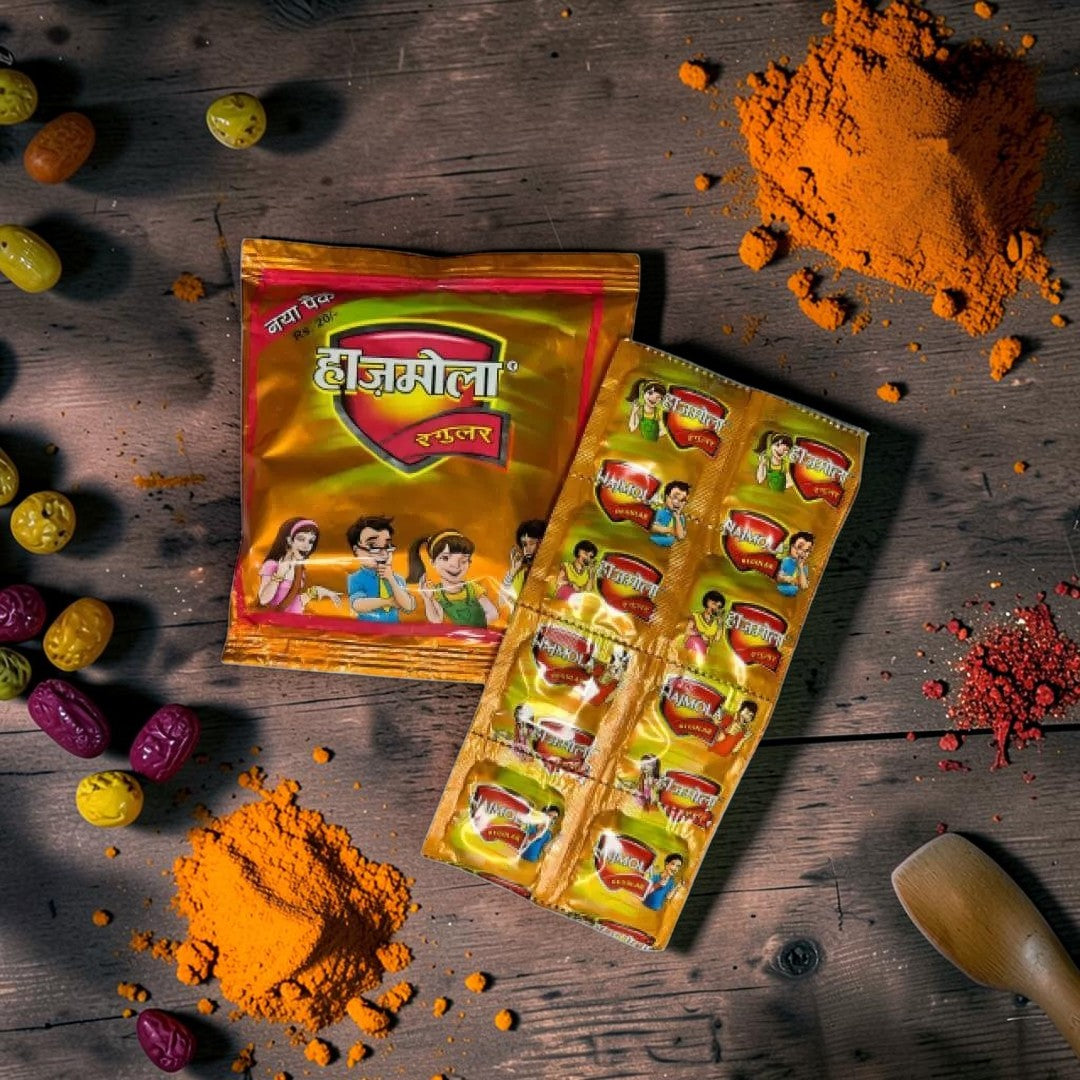 Desipan Hajmola Regular digestive candy pack with 10 individually wrapped candies. Golden packaging with cartoon illustrations of children.