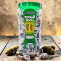 Desipan Humdum Emlle Roll tamarind candy in a large jar, individually wrapped, with loose candies scattered around.