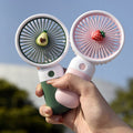 Desipan portable handheld mini fan with avocado or strawberry charm, green/white or pink/white