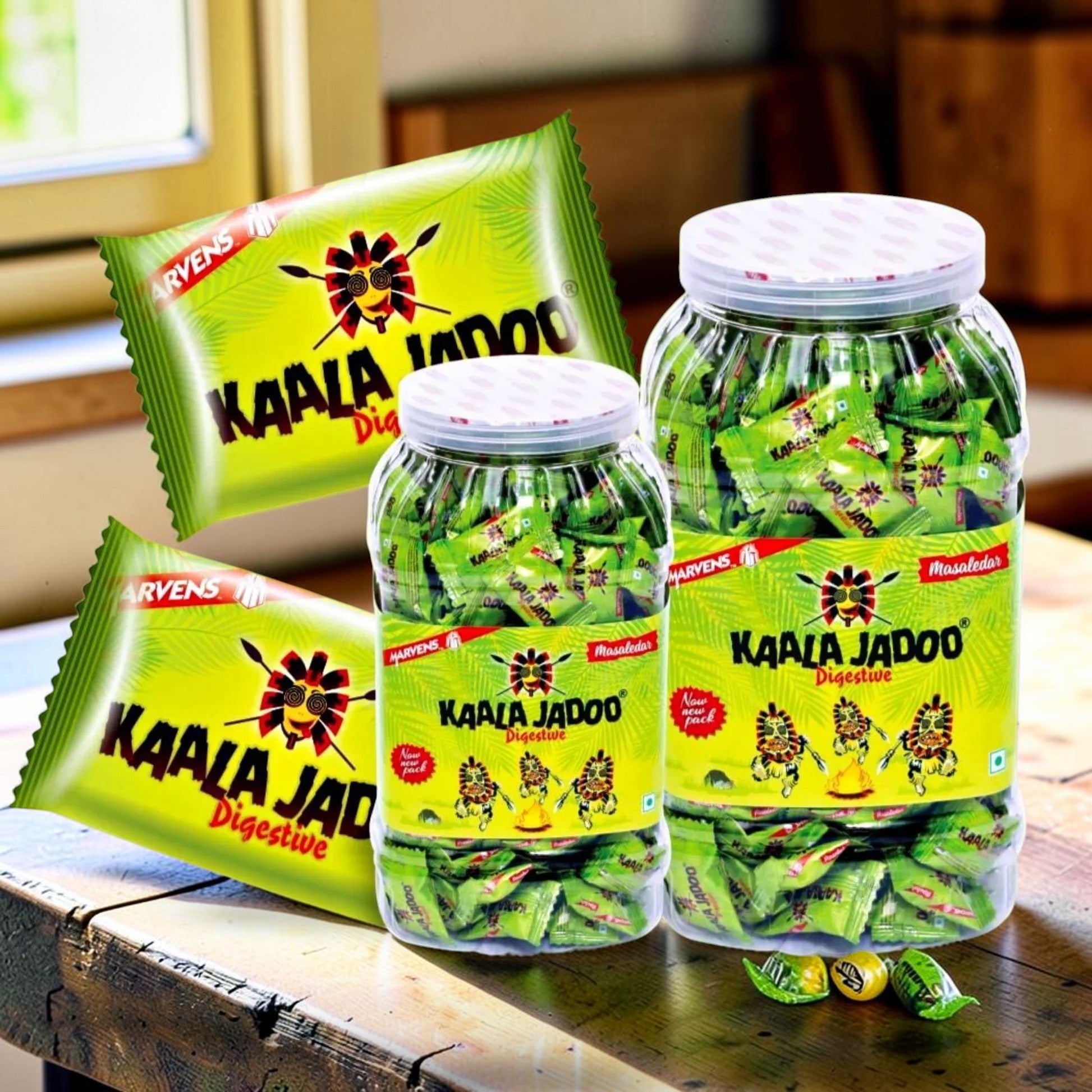 Desipan Kaala Jadoo Digestive candies in green wrappers, available in a jar and individual packs. Masaledar flavor.