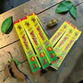 Desipan Tigidala Khatta Mitha Imli Candy Sticks, individually wrapped, sweet and sour tamarind flavor.