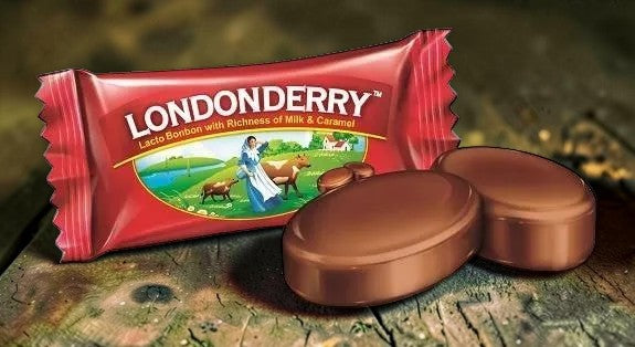 Desipan Londonderry Lacto Bonbons with milk and caramel, individually wrapped and unwrapped.