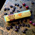 Desipan Lotte Coffy Bite Classic toffee candy with coffee beans and caramel cube graphic on gold wrapper.