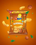 Desipan Oyes Manchurian Flavored Puffs Snack bag, featuring crunchy snacks and green leaves against an orange background.