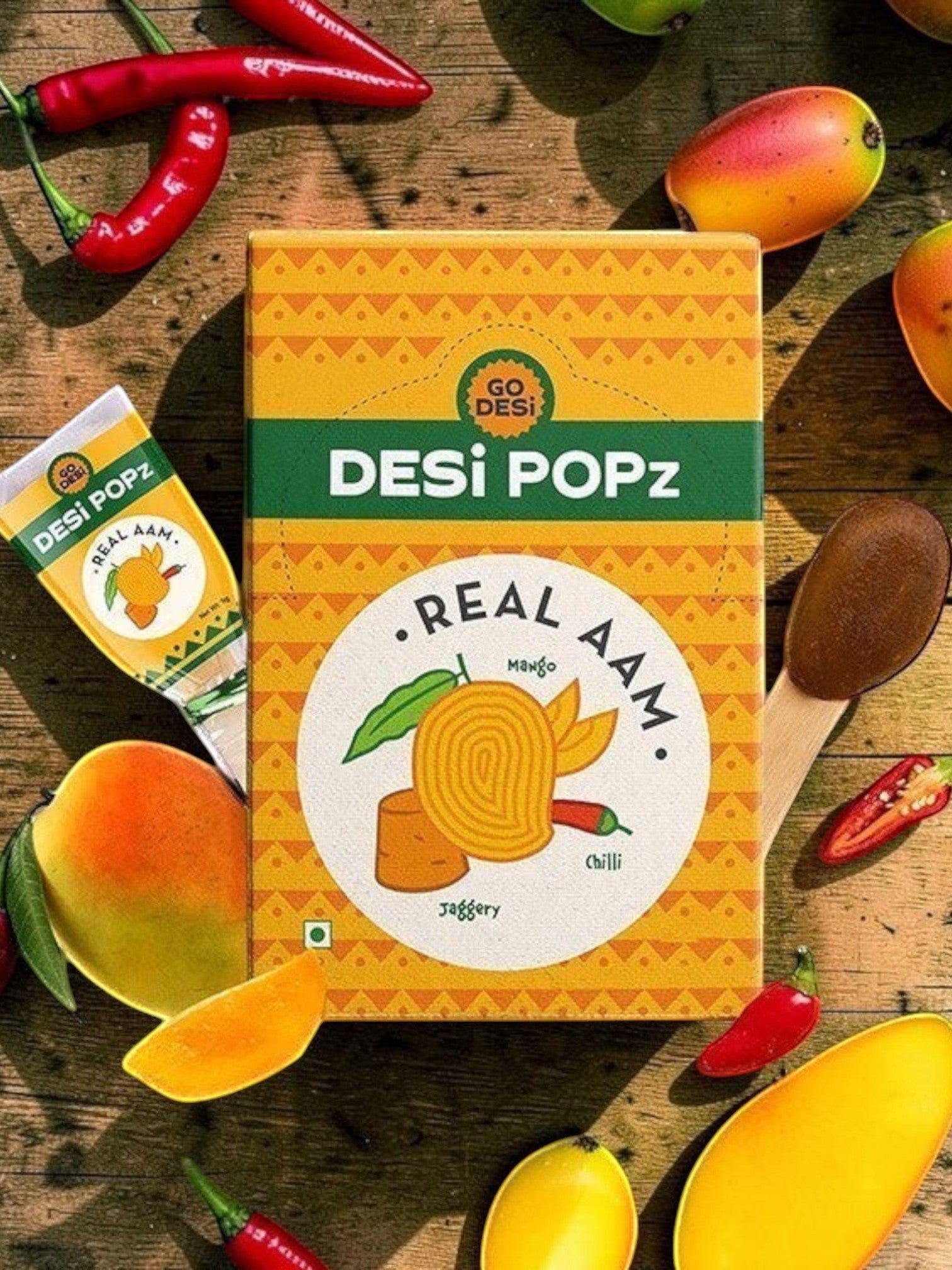 Desipan Desi Popz Real Aam Mango Jaggery Chilli candy with real mango, jaggery, and chili peppers.