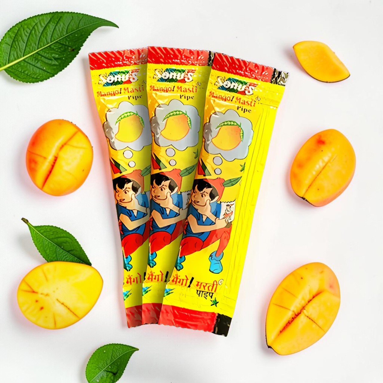 Desipan Sonu's Mango Masti Pipe candy, cone-shaped packaging with mango illustrations and cartoon characters.