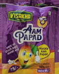 Desipan Masala Aam Papad fruit snack pouch featuring a cartoon mango character giving a thumbs up. Rich in Vit. C.