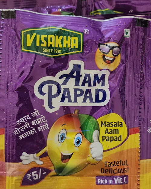 Desipan Masala Aam Papad fruit snack pouch featuring a cartoon mango character giving a thumbs up. Rich in Vit. C.
