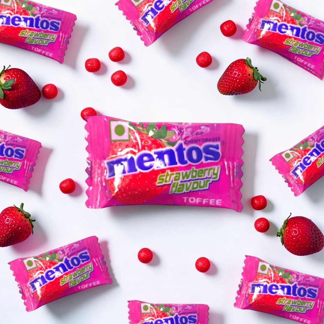 Desipan Mentos Strawberry Flavour Toffee Chewy Dragees candy wrappers with strawberry images.