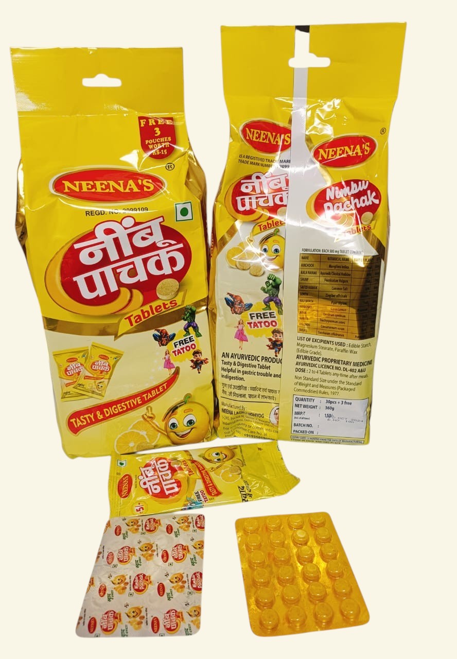 Desipan Neena's Nimbu Pachak Tasty & Digestive Tablets in yellow packaging with lemon mascot and cartoon characters. Includes free tattoo.