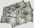 Desipan novelty Indian 500 Rupee banknotes in stacks, green and white with Mahatma Gandhi portrait.