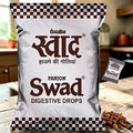 Desipan Panjon Swad Digestive Drops pouch with one individually wrapped drop. Silver packaging with brown checkered trim and text.