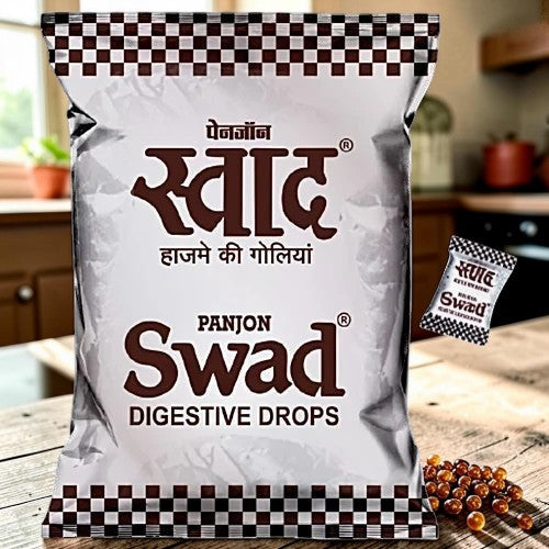 Desipan Panjon Swad Digestive Drops pouch with one individually wrapped drop. Silver packaging with brown checkered trim and text.