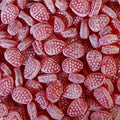 Desipan Raspberry Bonbons, classic hard candies dusted with sugar, offering a fruity raspberry flavor and old-fashioned shape.