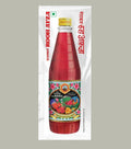 Desipan Sharbat Rooh Afza ruby-red herbal drink concentrate in a glass bottle with a decorative label featuring fruits and flowers.