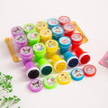 Desipan assorted Sanrio character self-inking stampers in purple, green, yellow, blue, and red. Features My Melody, Kuromi, Cinnamoroll, Pompompurin.