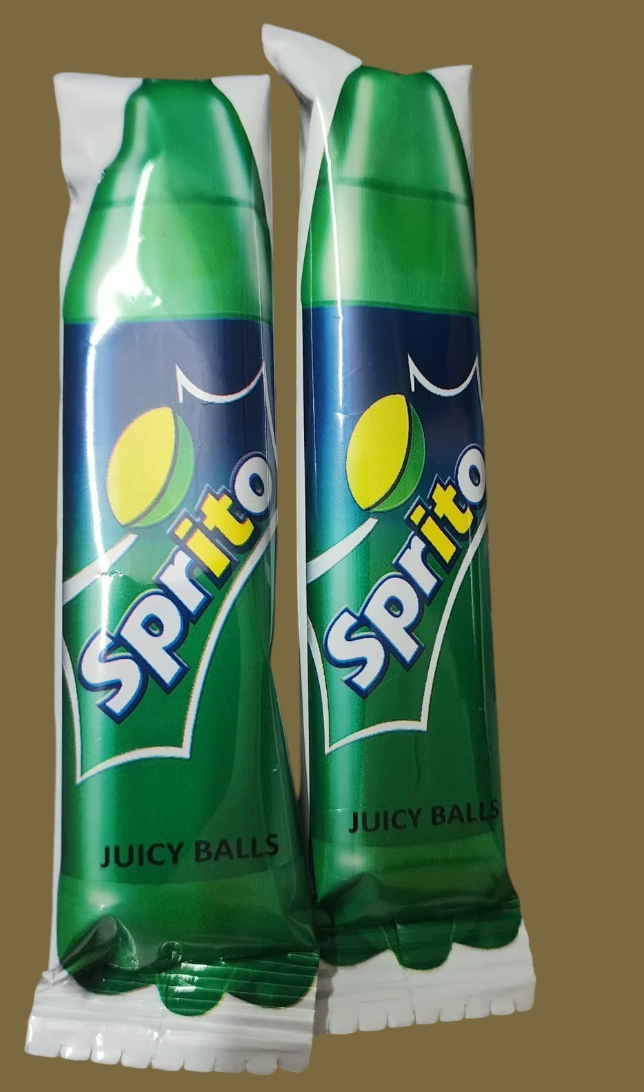 Desipan Sprite Juicy Balls candy, two individually wrapped green lime-flavored treats with iconic logo.