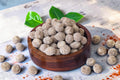 Desipan Sweetened Peanut Balls in a wooden bowl, a healthy and crunchy snack.