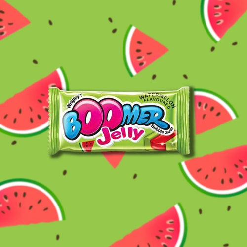 Desipan Wrigley's Boomer Jelly Bubble Gum, Watermelon flavour, green packaging with pink and blue lettering, surrounded by watermelon slices.